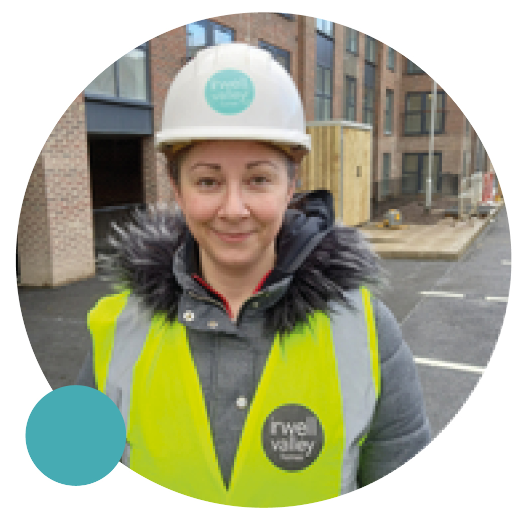 Irwell Valley Employee in a Hi vis and Irwell Valley hard hat