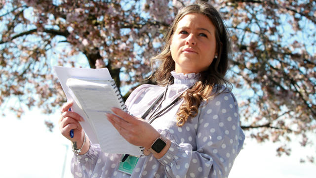 Irwell Valley Employee holding notes and a pen