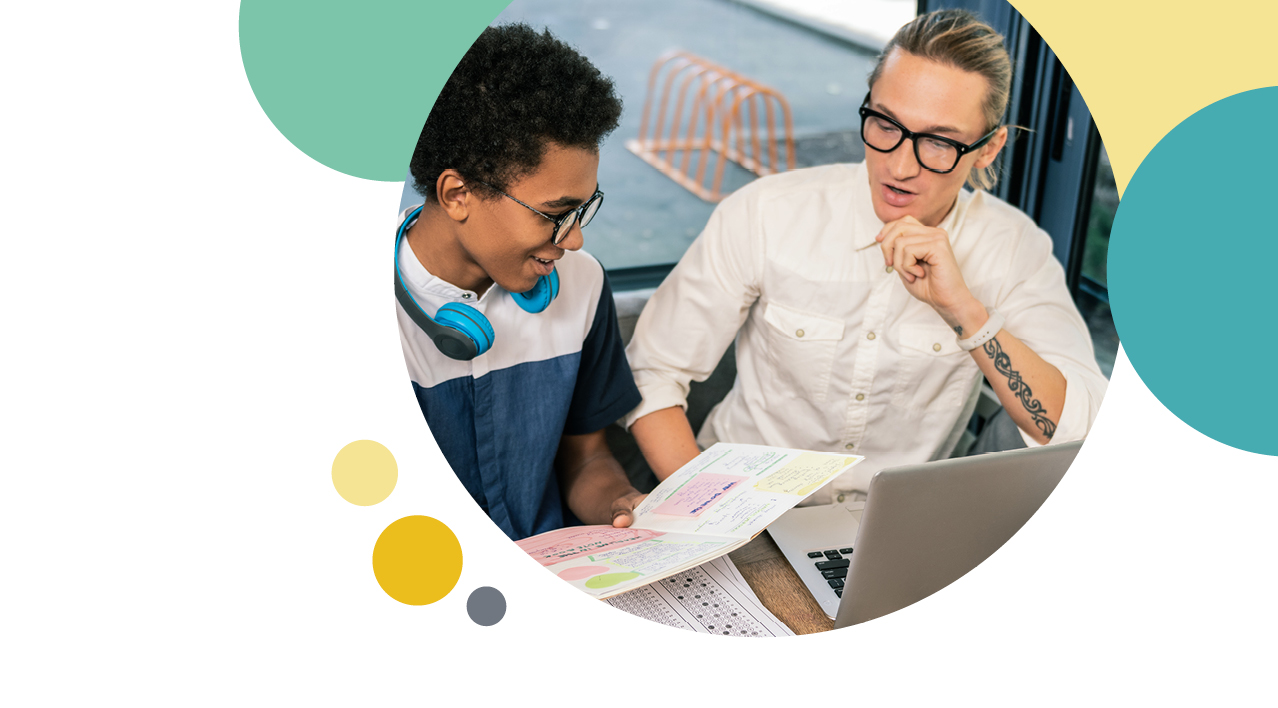 Two men studying for their test