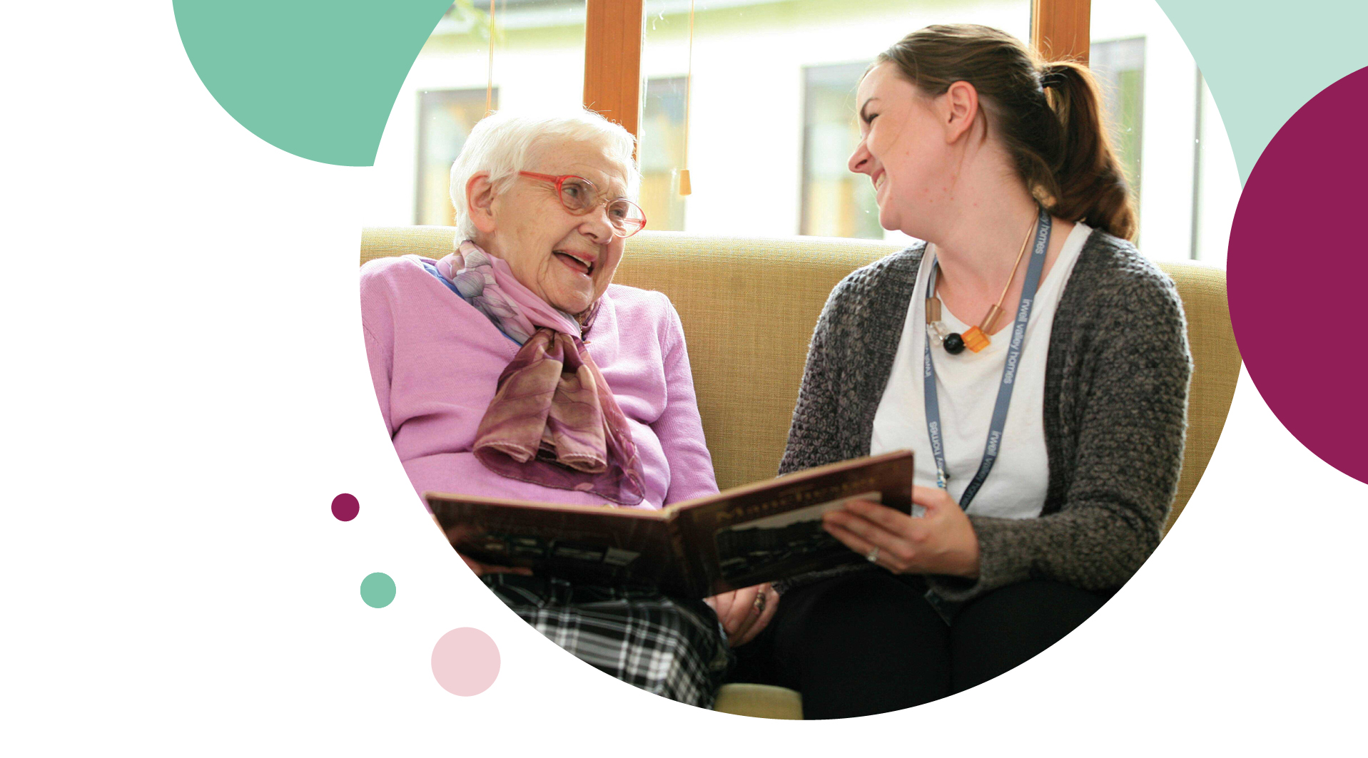 Irwell Valley Employee reading a book with a resident
