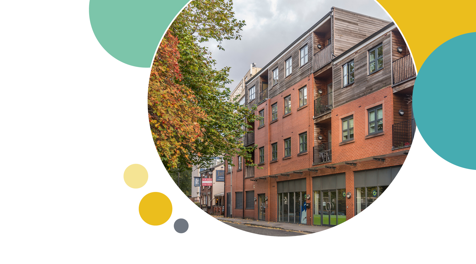 Wood and Brick property above some shops
