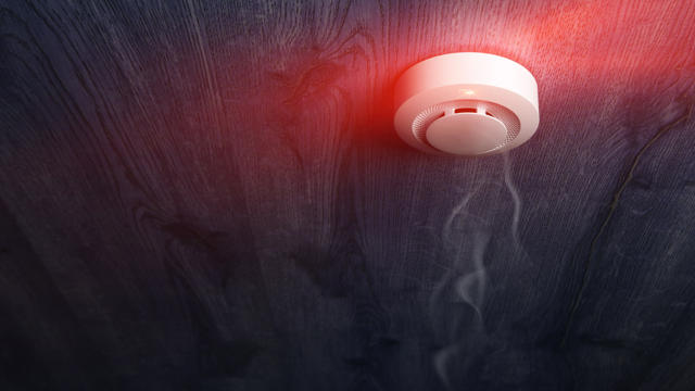 Smoke alarm with a bright red light