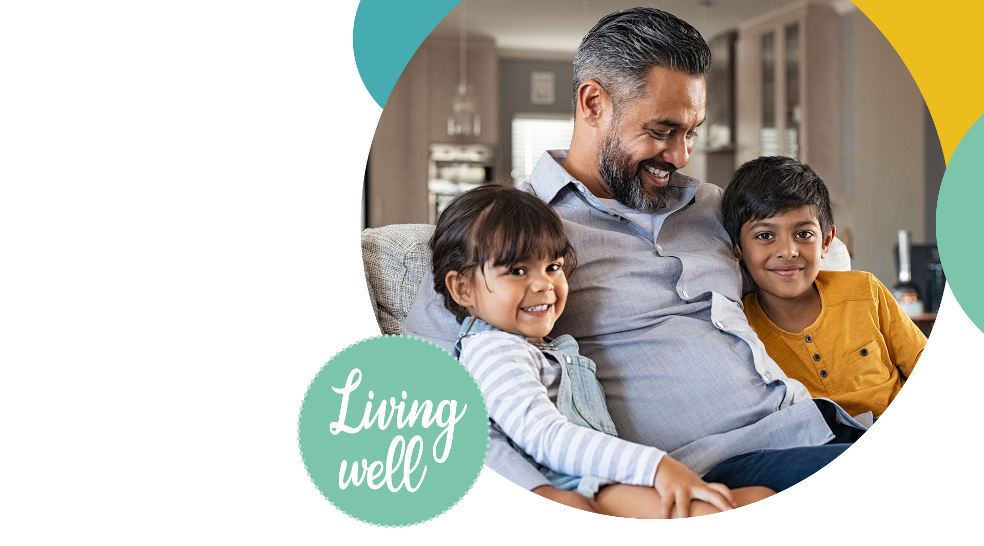 Dad, Son and daughter sitting on the sofa together