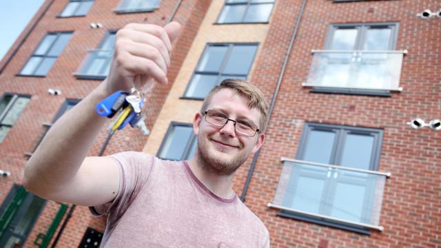 Resident receiving his keys