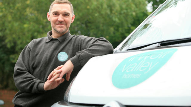 Irwell Valley Employee posing on his van