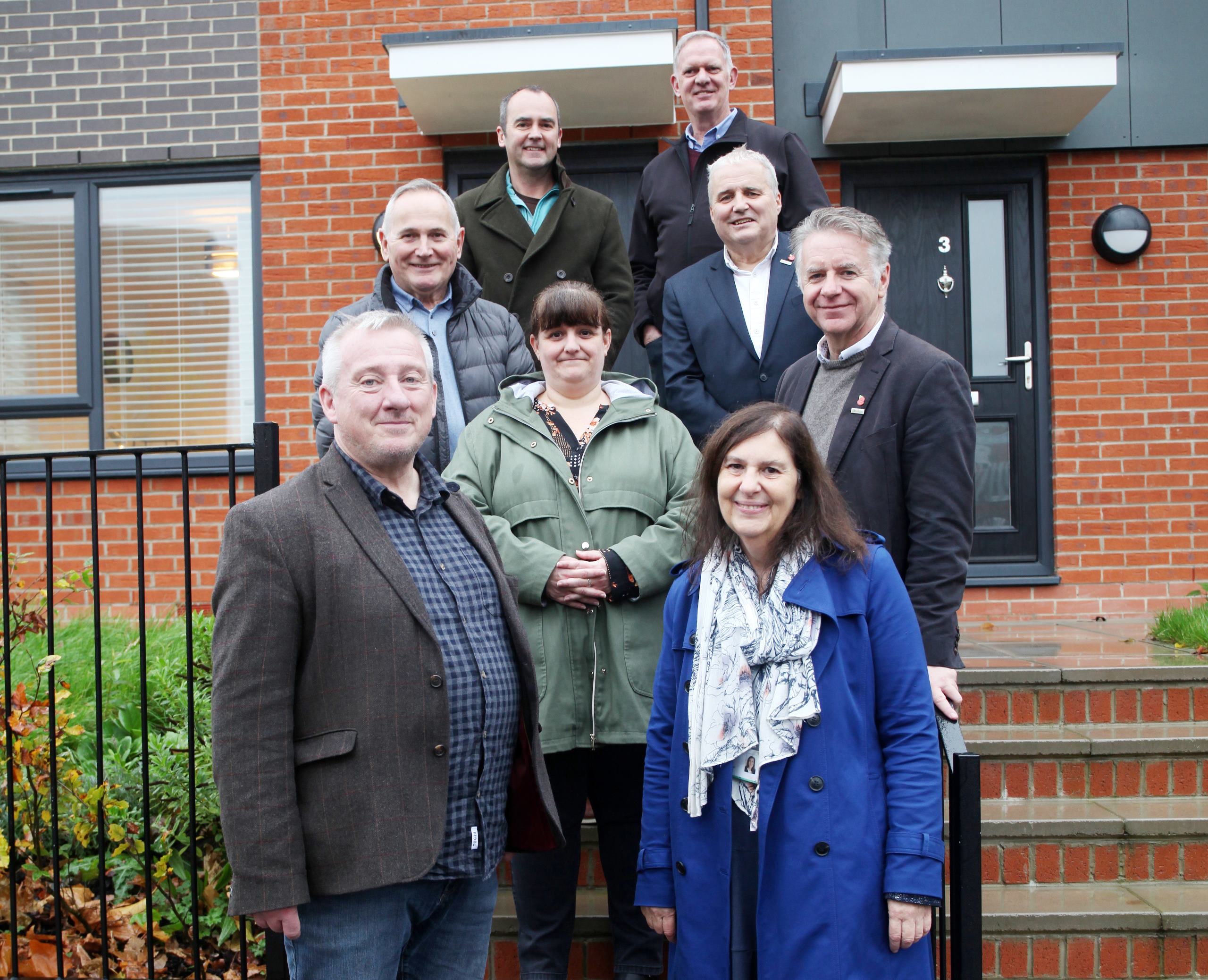 Irwell Valley and Bolton at home staff by one of the Bolton properties 