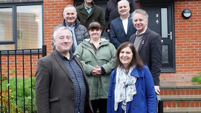 Irwell Valley and Bolton at home staff by one of the Bolton properties 