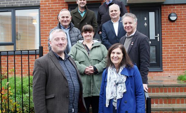 Irwell Valley and Bolton at home staff by one of the Bolton properties 