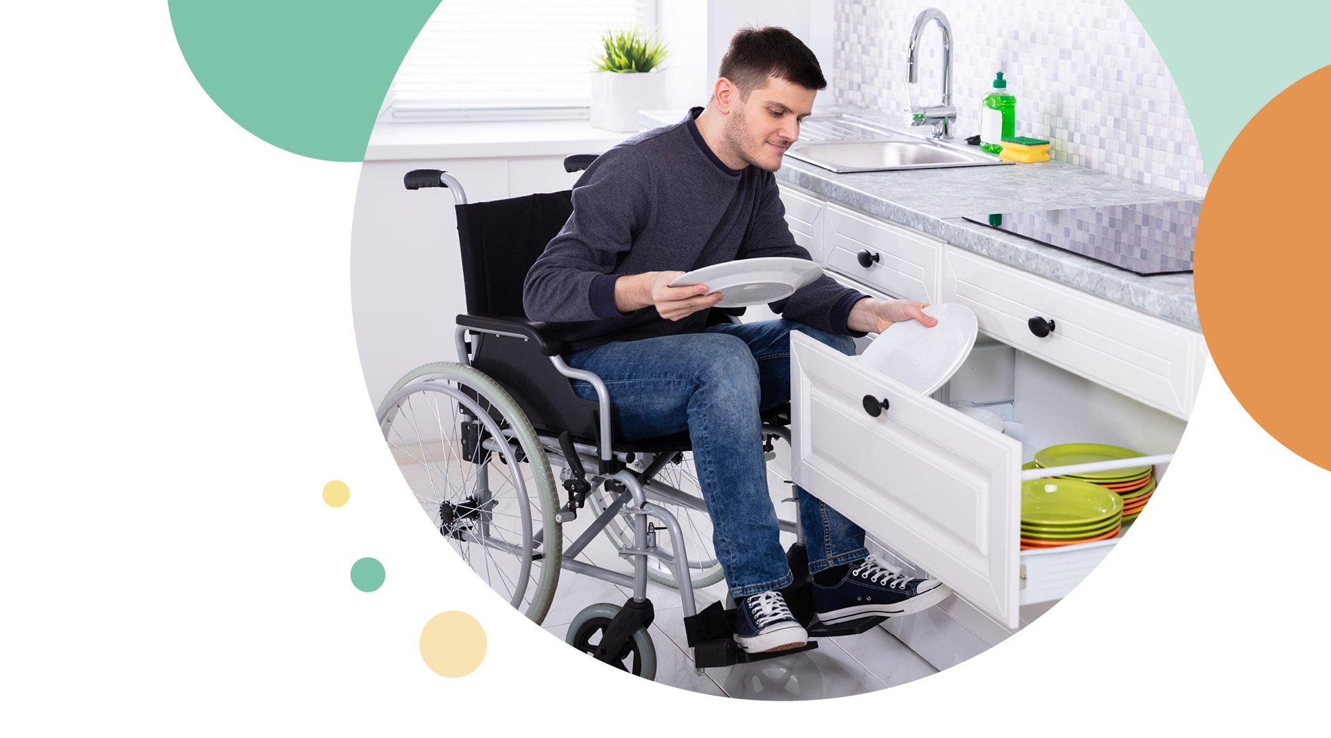 A man in a wheelchair filling his draw with his plates