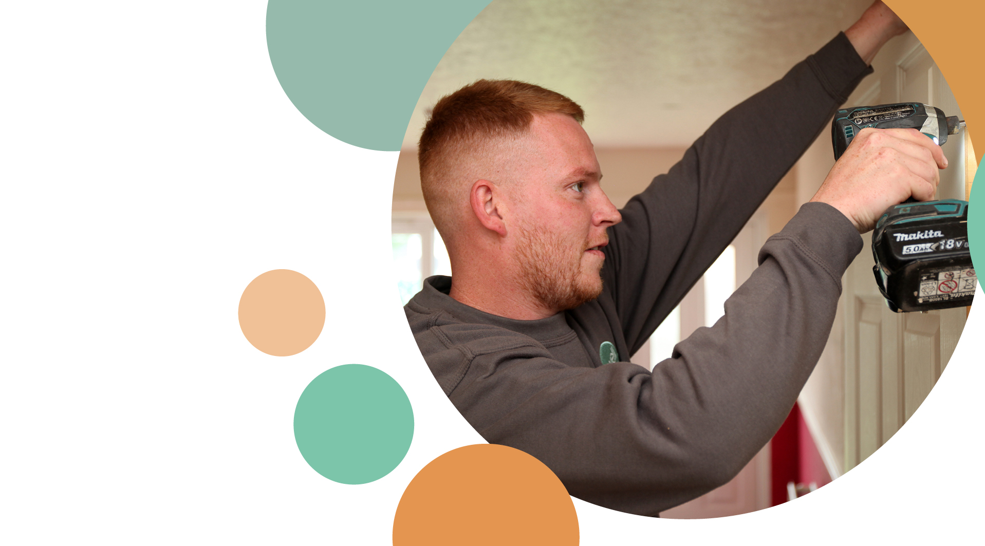 An Irwell Valley Employee drilling the hinges of a door