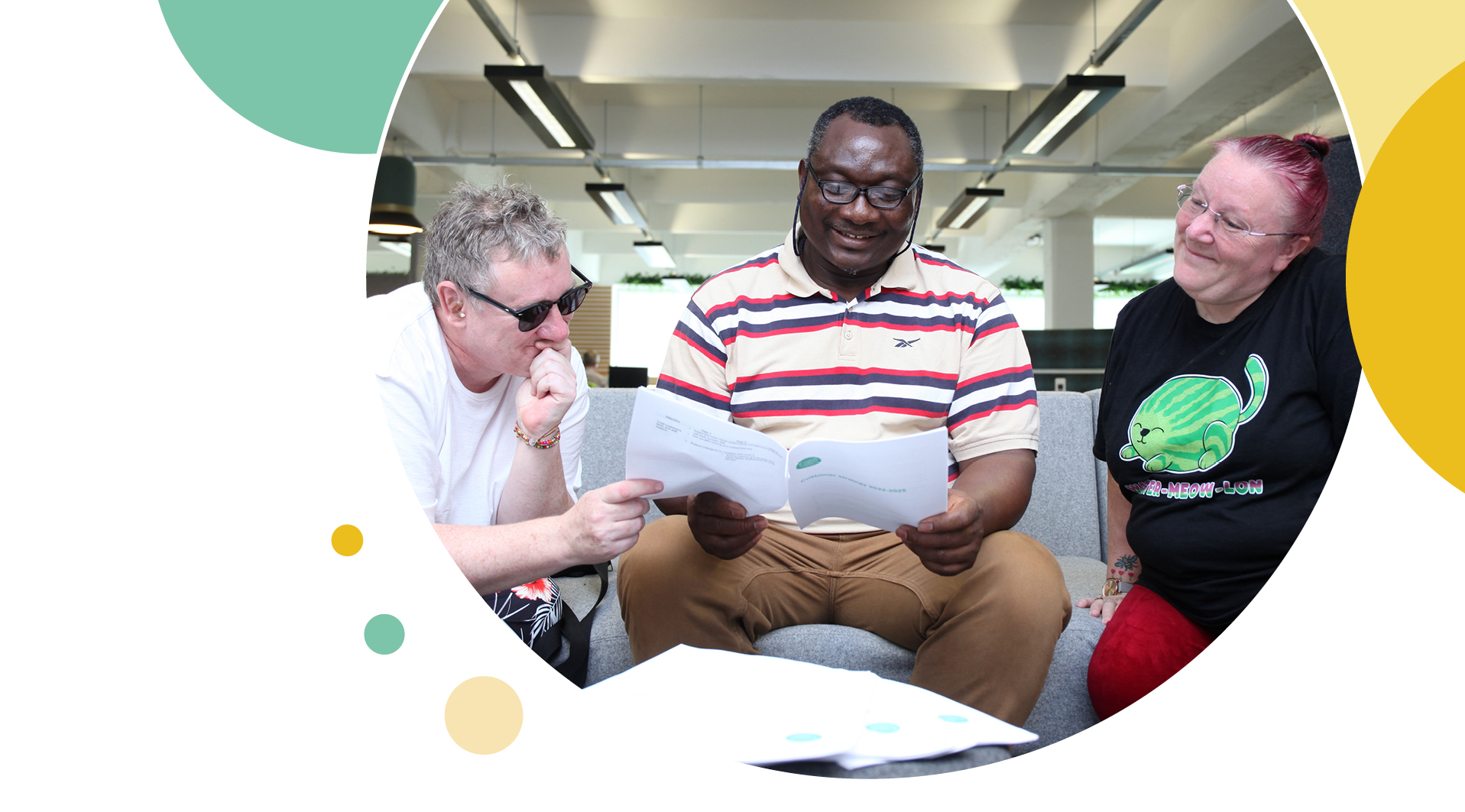 Three people looking happy reading a letter from Irwell Valley