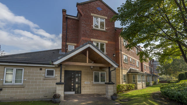 Outside of Greenbank with grass and trees
